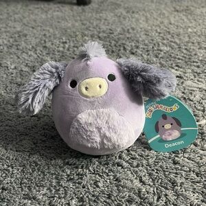 NWT Squishmallow whose name is Deacon